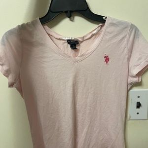 pink polo shirt
